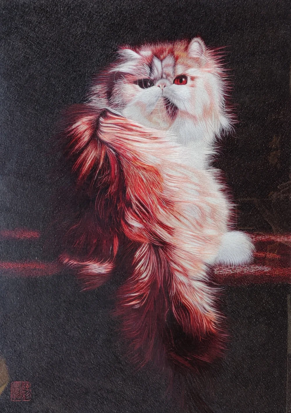 Su embroidery portrait of a long-haired cat against a dark background